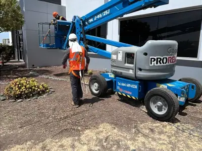 Storefront sign installed from a boom lift