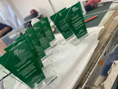 Custom cut green acrylic pieces