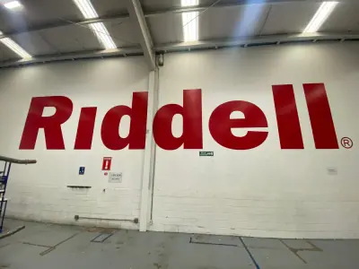 Wall vinyl with brand imagery · Riddell