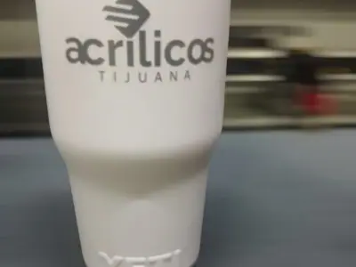 Laser engraved tumbler with a logo