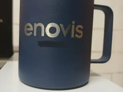 Engraved mug for an internal program · Enovis